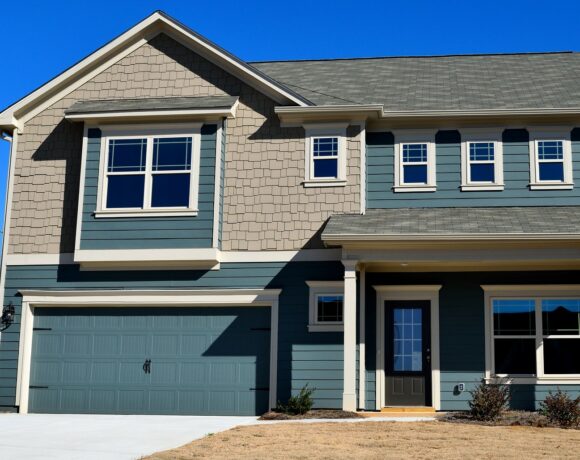 House with blue Garage Doors in OKC, Oklahoma City, Edmond, Mustang, El Reno, Piedmont & Surrounding Areas 